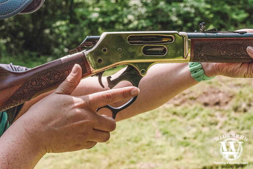 a detail photo of a henry rifle