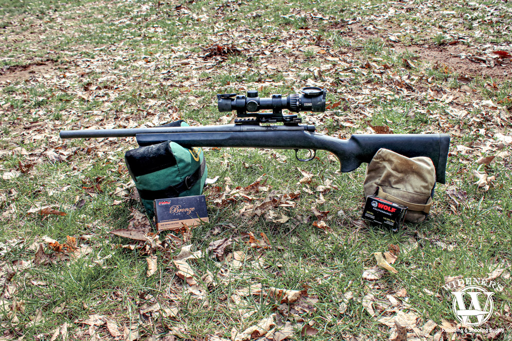 a photo of a bolt action rifle with a 308 win ammunition