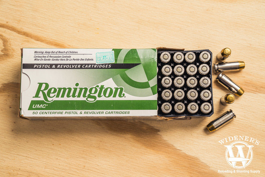 a photo of remington best 10mm ammo on a sheet of plywood
