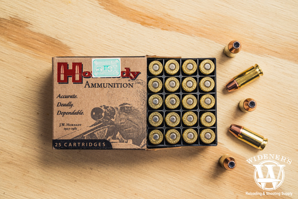 photo of Hornady Custom 9mm 124 Grain XTP JHP on plywood