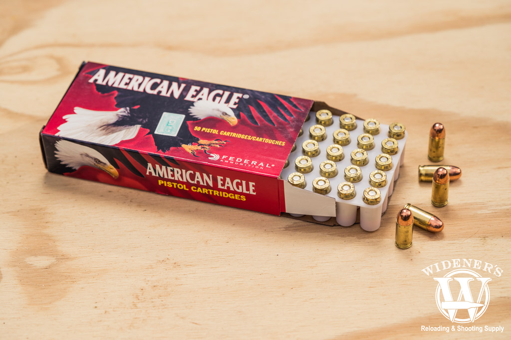 photo of federal american eagle best 380 ammo on a sheet of plywood