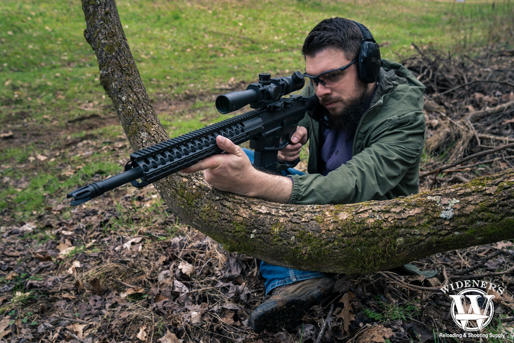 photo of a man shooting a 308 rifle outdoors