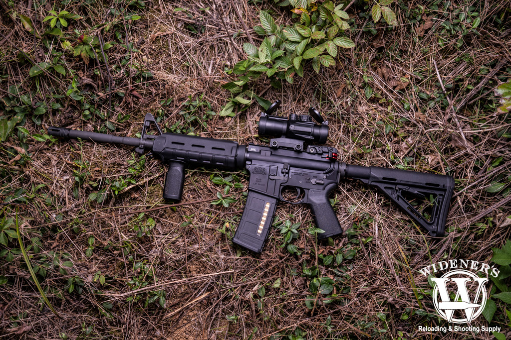 photo of history of the AR-15 rifle with magpul furniture outdoors