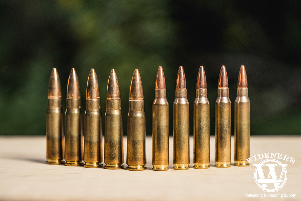 photo of 223 ammo next to 762x39 ammo outdoors