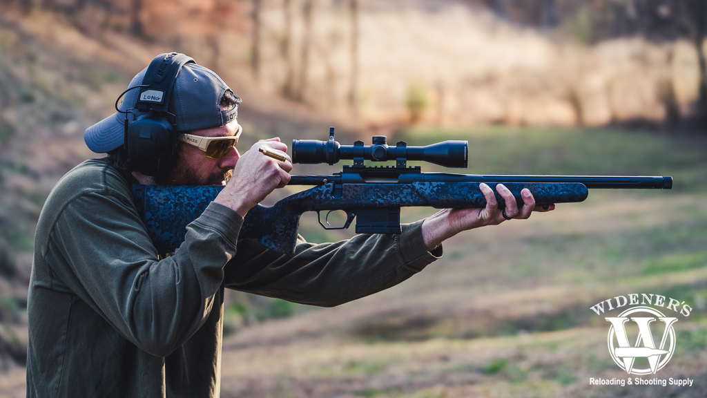 shooting the best bolt action rifle a photo of a man shooting the best bolt action rifle