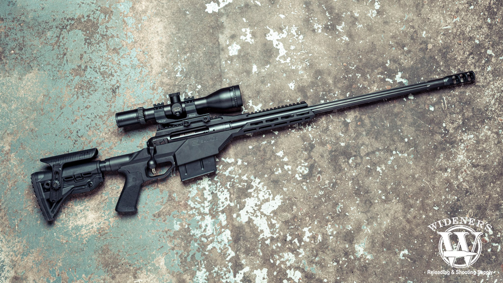 a photo of a bolt action precision rifle with muzzle brake