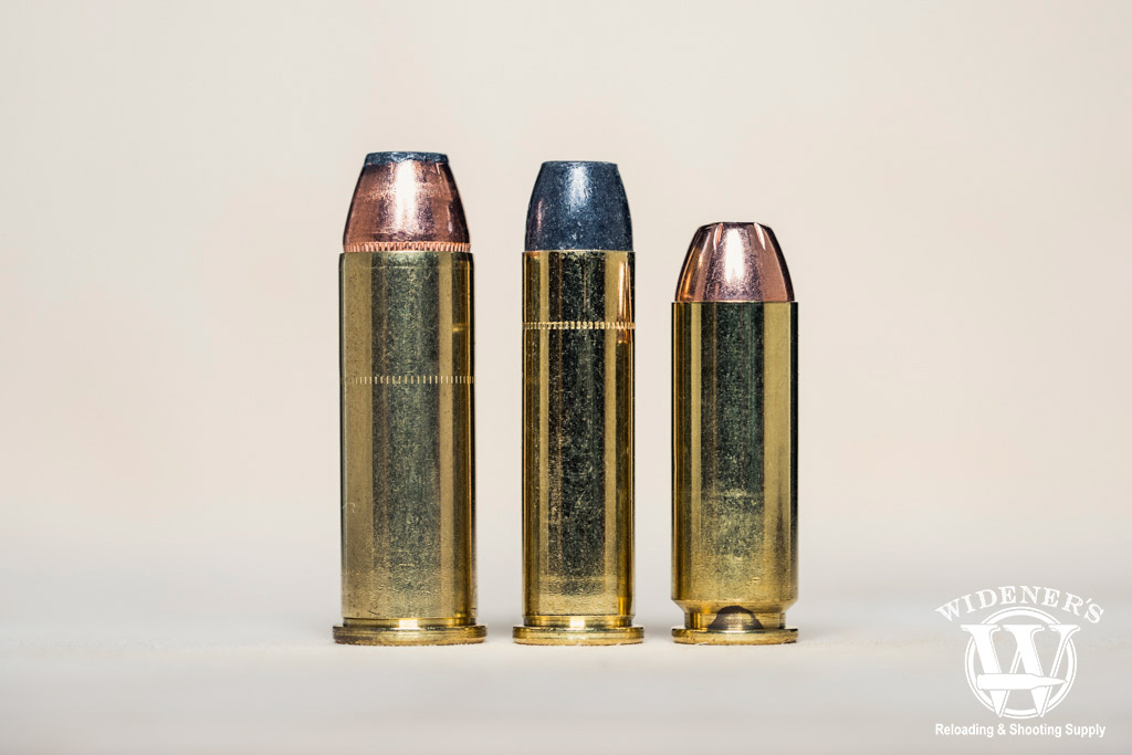 a macro photo comparing magnum ammo