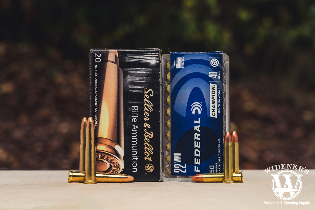 a photo comparing centerfire vs rimfire fmj ammo
