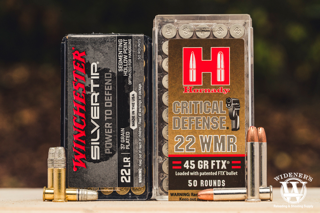 a photo comparing 22 LR VS 22 WMR defense ammo
