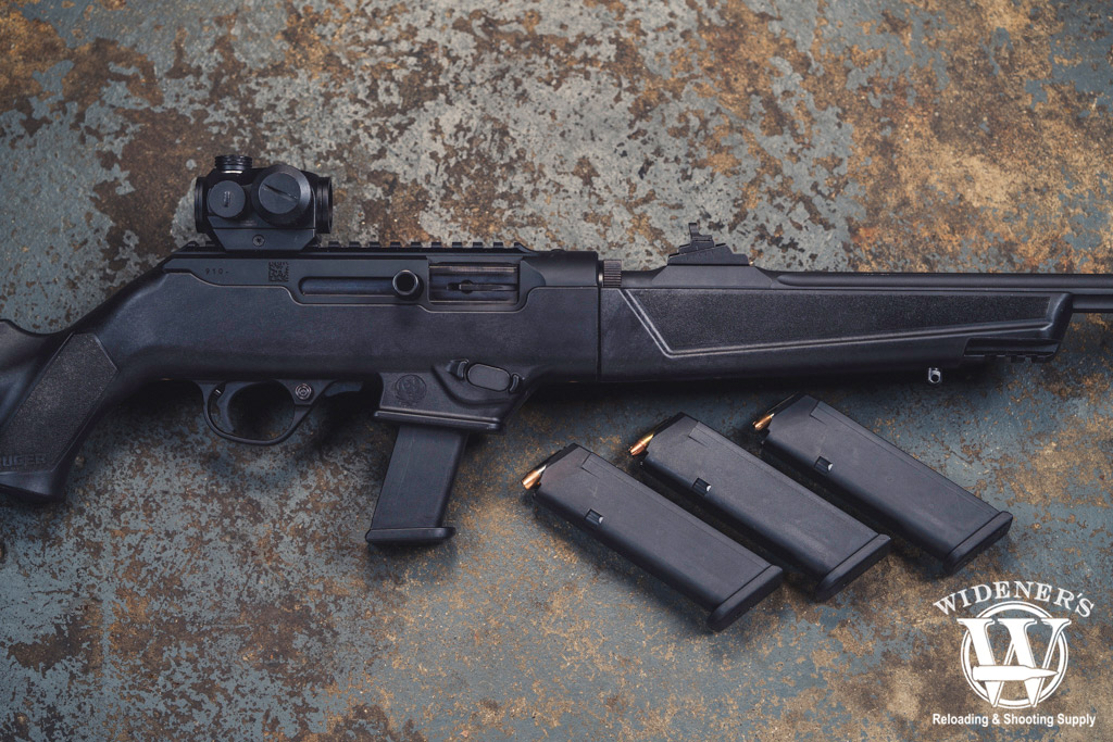 a photo of the ruger pc carbine and glock magazines