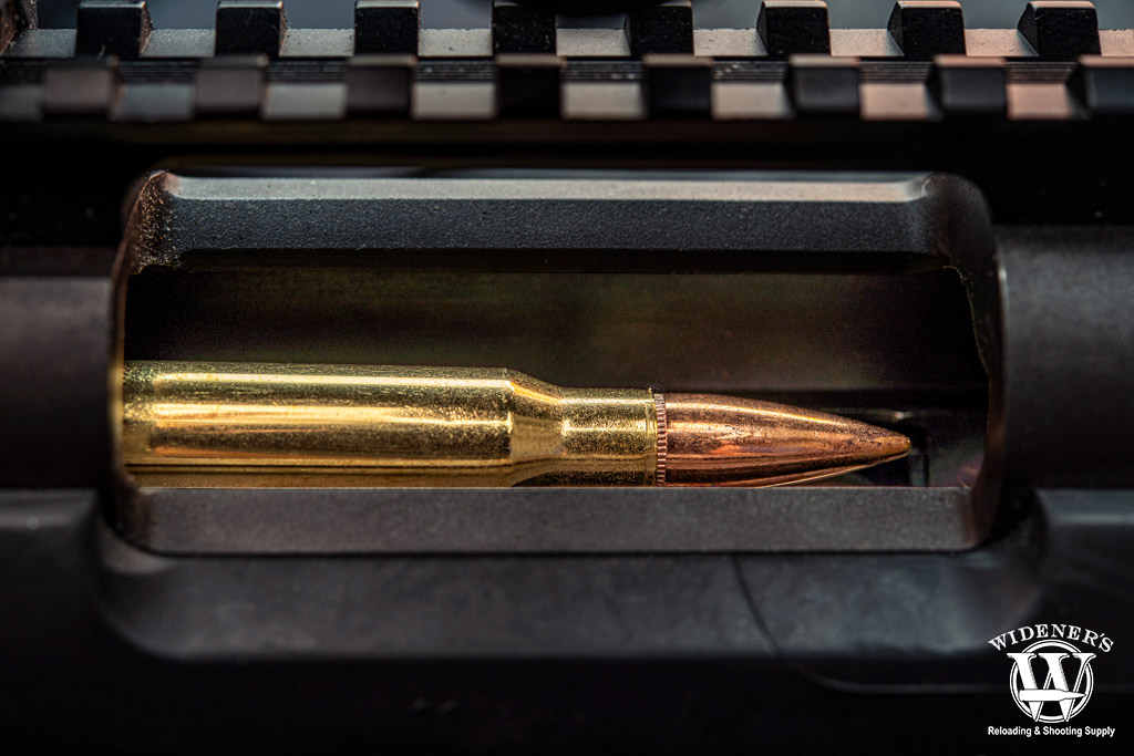 photo of a 308 win cartridge in a bolt action rifle