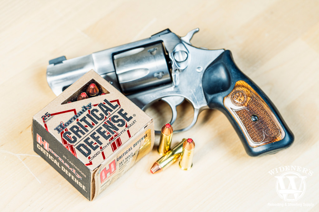 a photo of a revolver with hornady critical defense ammo