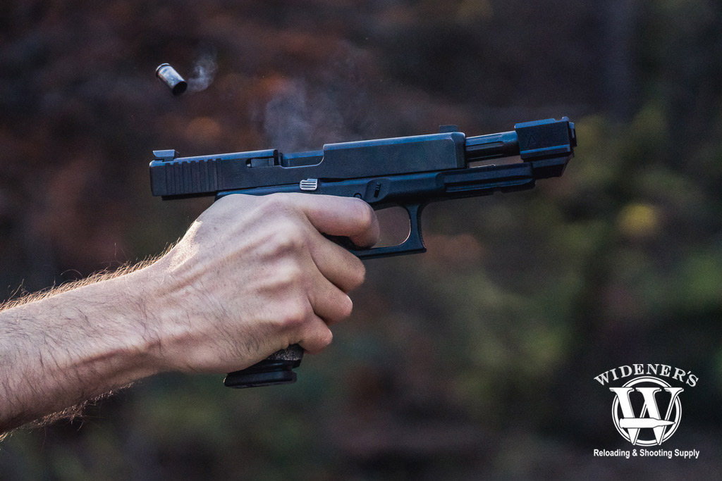 demonstrating handgun recoil with a compensator a photo demonstrating handgun recoil with a compensator