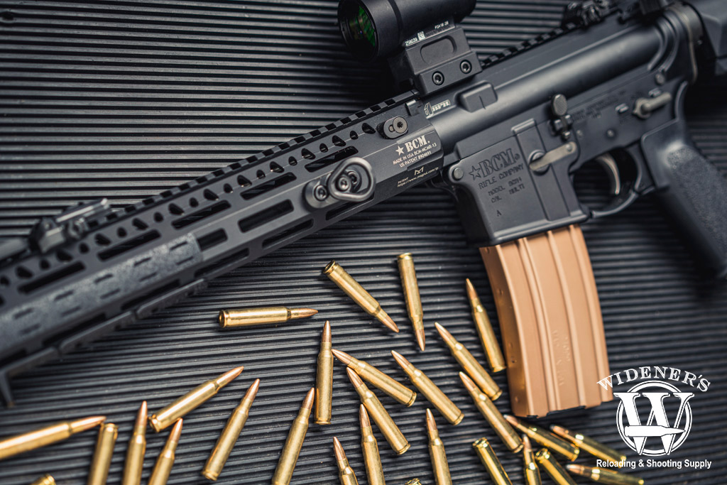 a photo of a ar-15 rifle with 223 Rem ammo