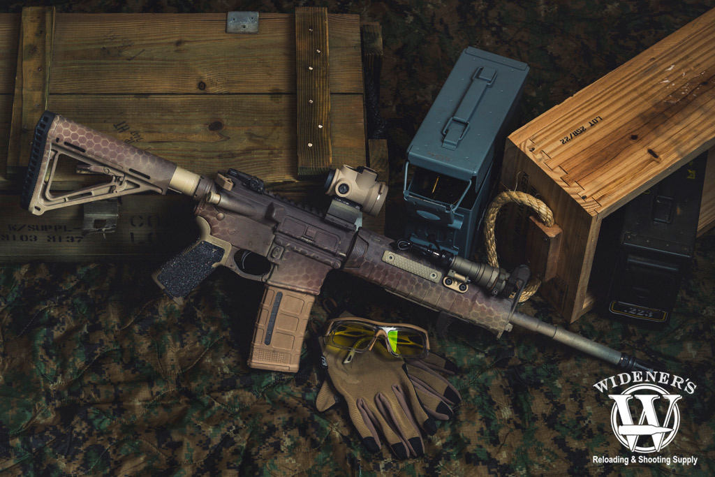 A photo of an ar-15 rifle with accessories