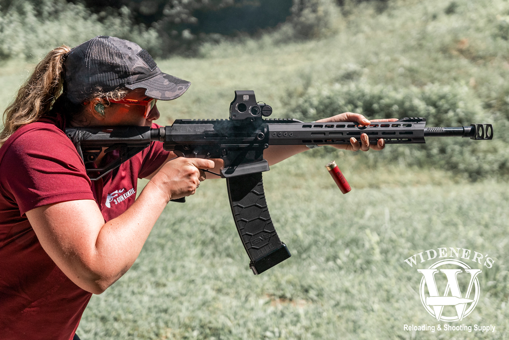 a photo of kenzie fitzpatrick shooting the Gen-12 shotgun from Genesis Arms