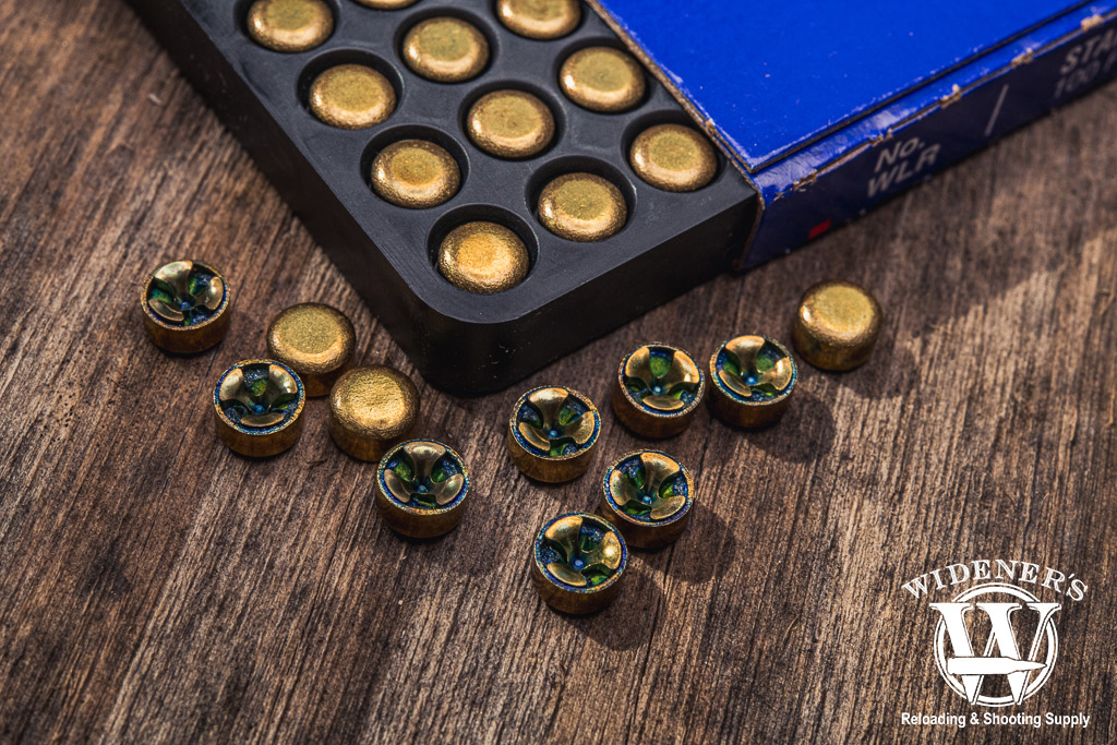 a macro photo of primers for centerfire rifle ammunition