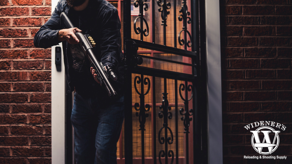 man defending his home with a remington 870 shotgun photo of a man defending his home with a remington 870 shotgun