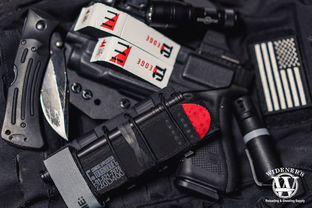 a photo of an everyday carry kit with tourniquet
