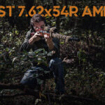 a photo of a man shooting the best mosin nagant ammo outdoors