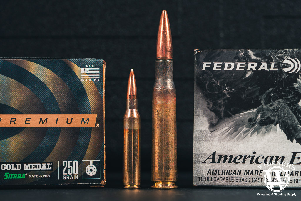 a photo comparing 338 Lapua Magnum VS 50 BMG