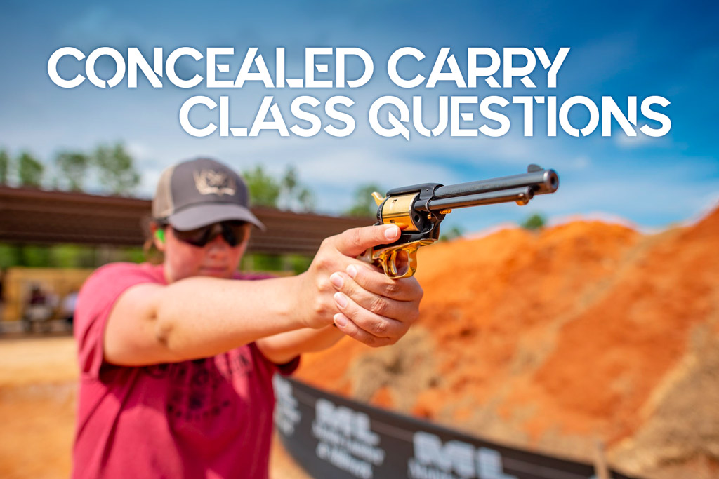 a photo of concealed carry class instructor firing a pistol at an outdoors gun range