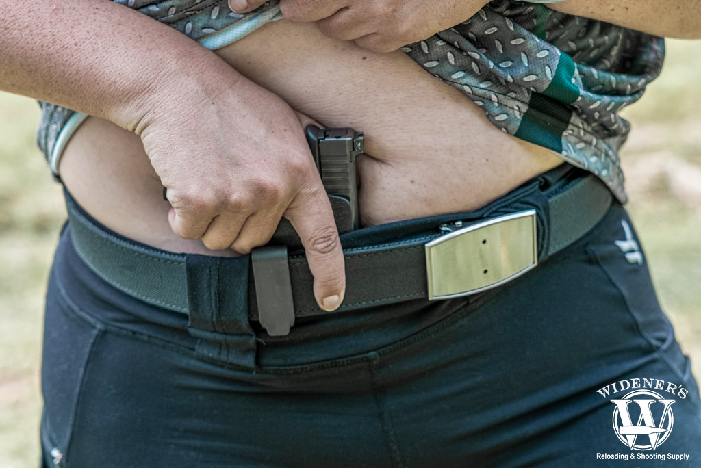 a woman concealed carrying a handgun