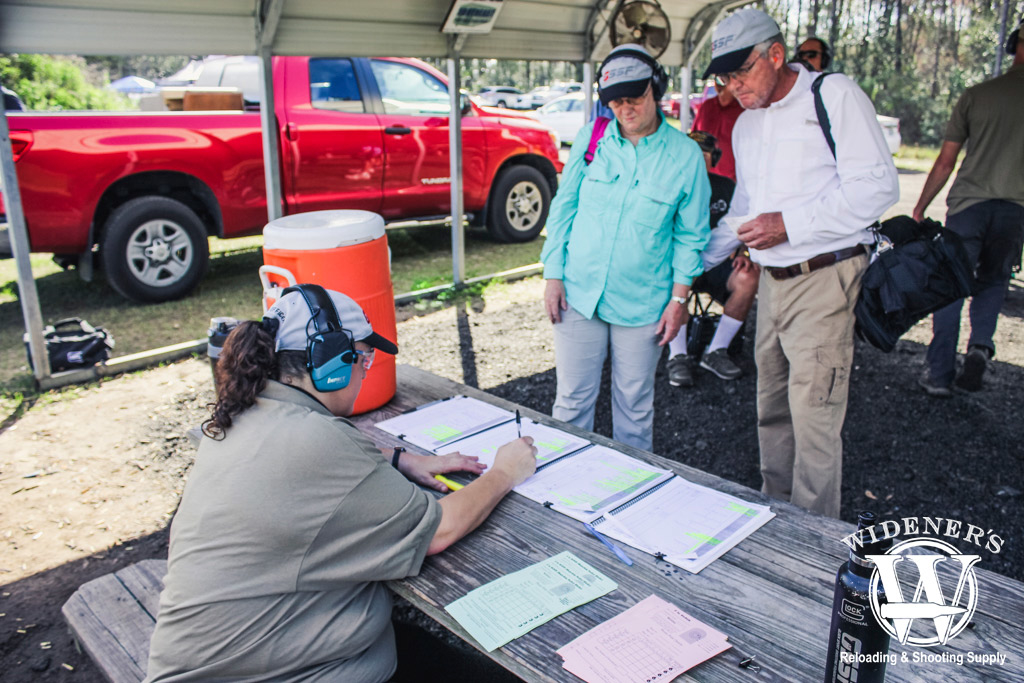 photo of a couple signing up to participate in a glock gssf match