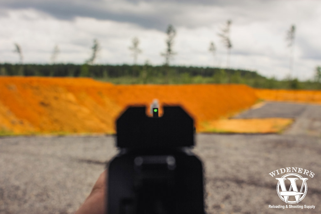 a photo aiming down the sights of a handgun