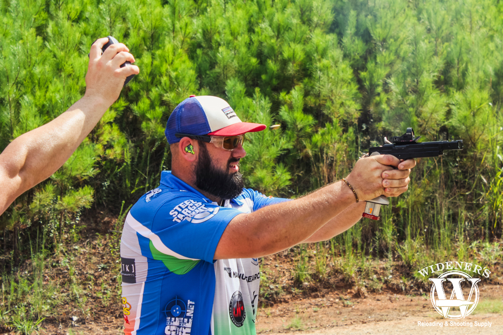 a photo of a male competition shooter at steel challenge