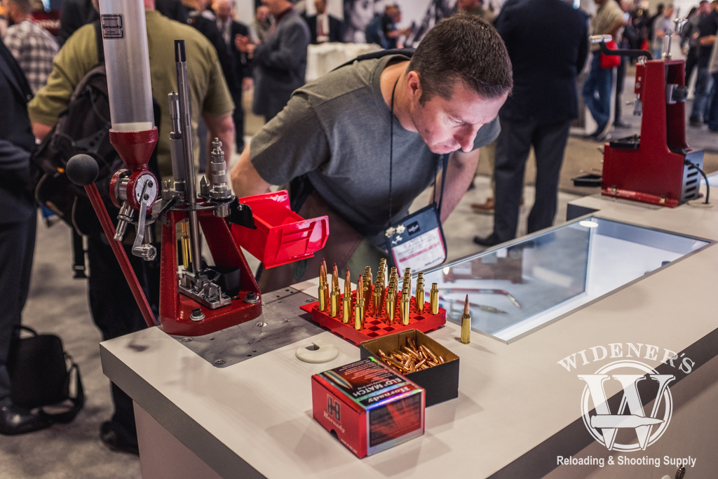 photo of a SHOT Show attendee looking at the Hornady reloading supplies