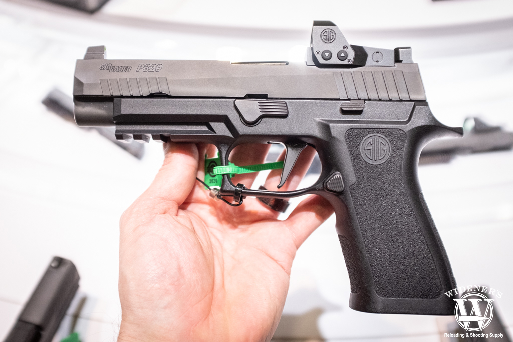 a photo of the Sig Sauer P320 RXP 9mm pistol with romeo1 pro optic