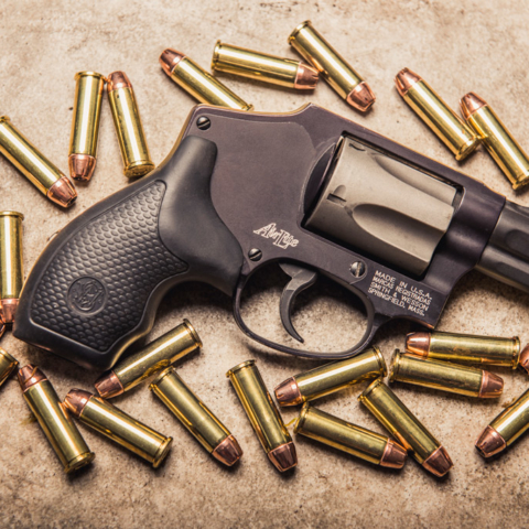 photo of smith and wesson 38 special revolver with ammo