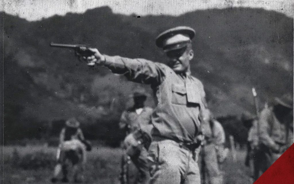 a photo of chesty puller shooting a revolver