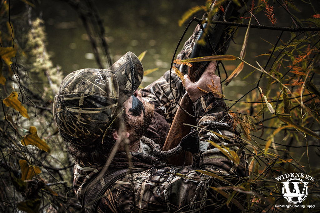 a photo of a man duck hunting