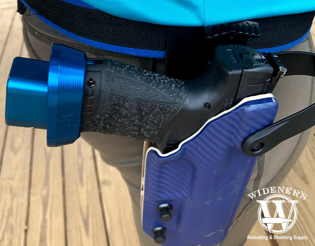 a photo of a walther ppq pistol in a holster with magazine extension