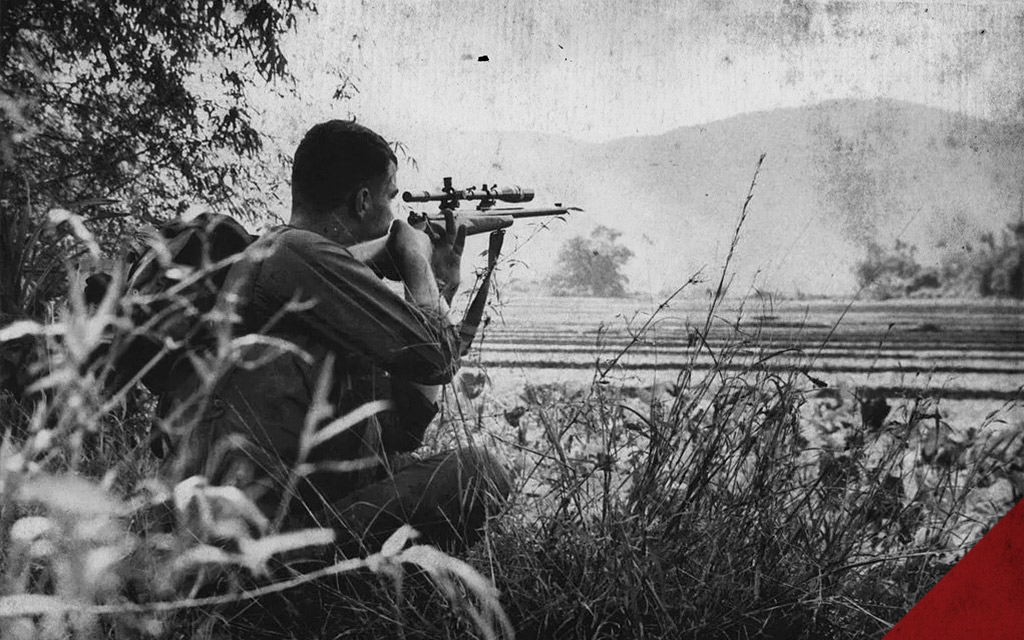 a historic photo of a marine sniper in vietnam