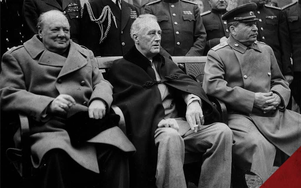 A historical photo of winston churchill at the yalta conference