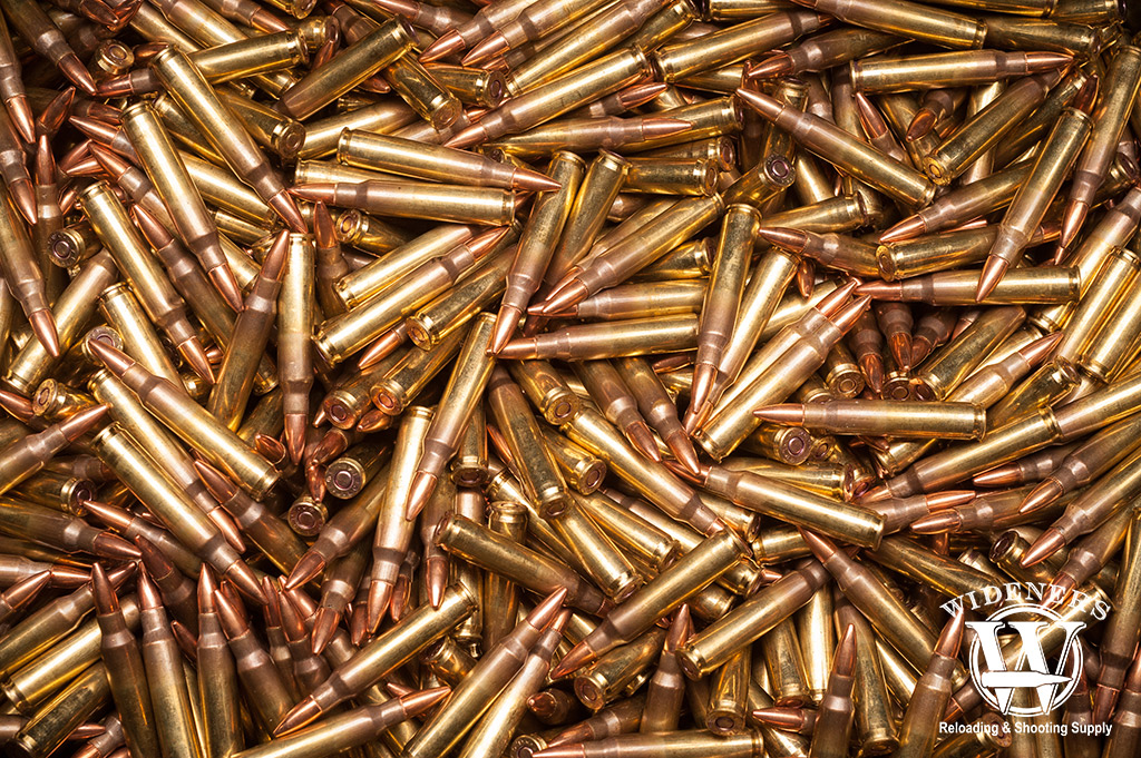 a photo of a large pile of 223 ammo