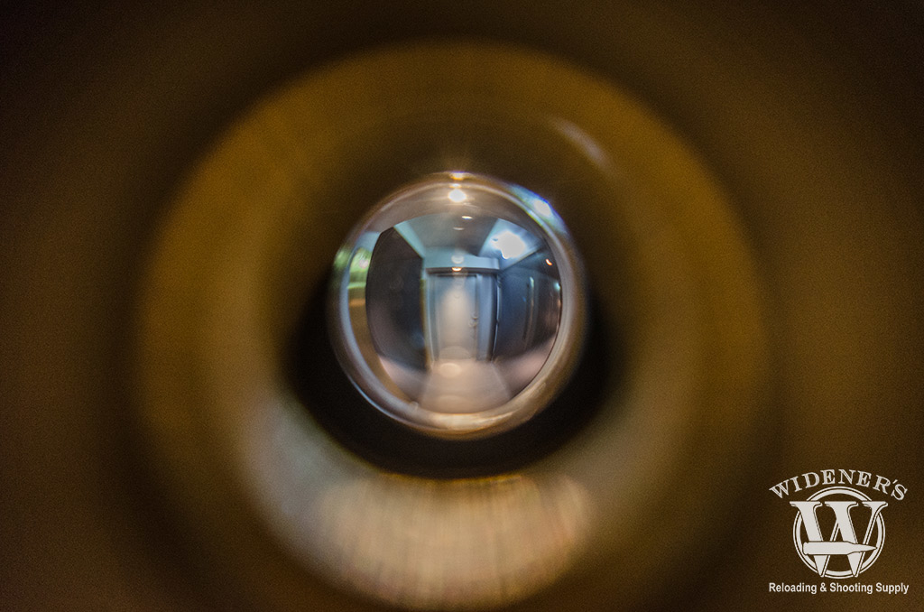 photo pov looking through a peephole at an apartment complex